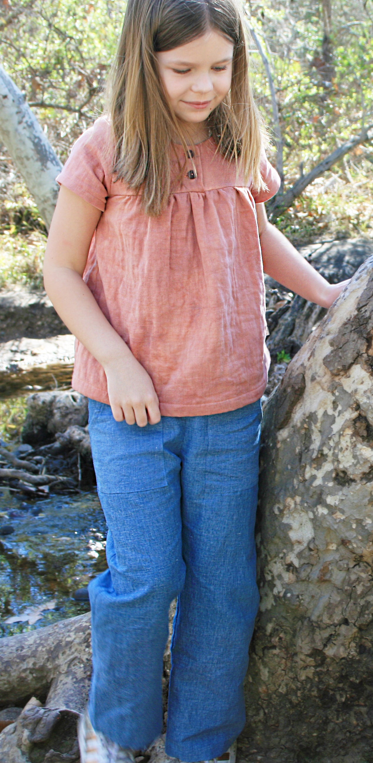 Our model is wearing size 8/9, is 8.5 years old and is 67 pounds, 52.5" tall.